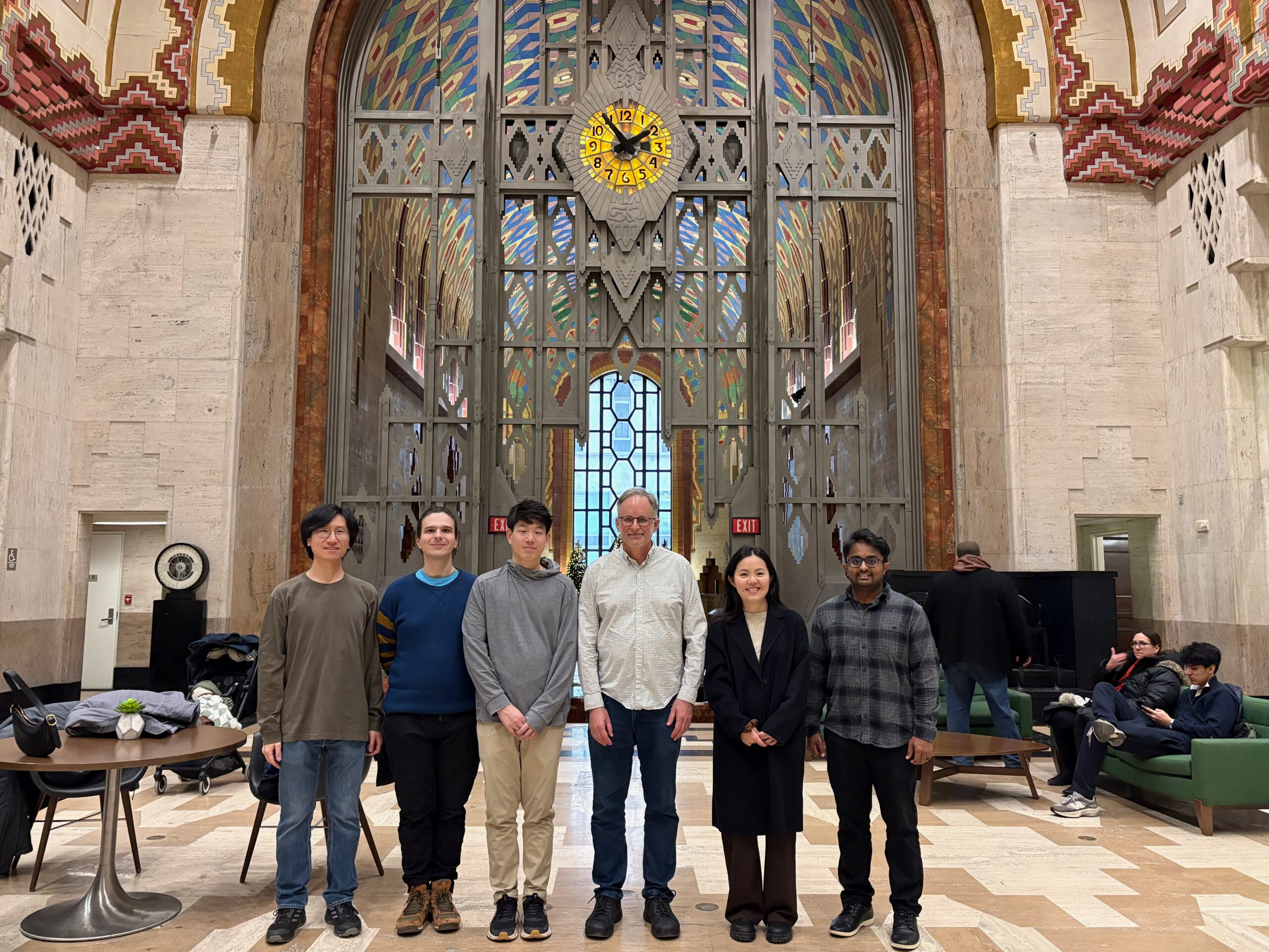 Group outing in December 2025. Guardian Building, Detroit. Missing: Siva Heramb Peddada.